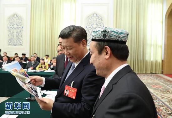 習近平參加新疆代表團審議,。新華社記者 馬占成 攝