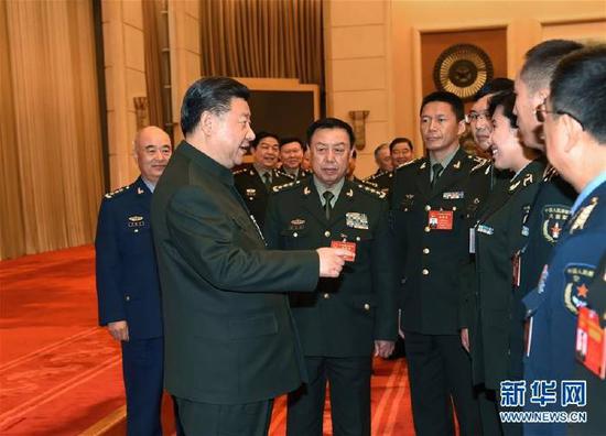 習近平出席解放軍代表團全體會議并發(fā)表重要講話,。新華社記者 李剛 攝
